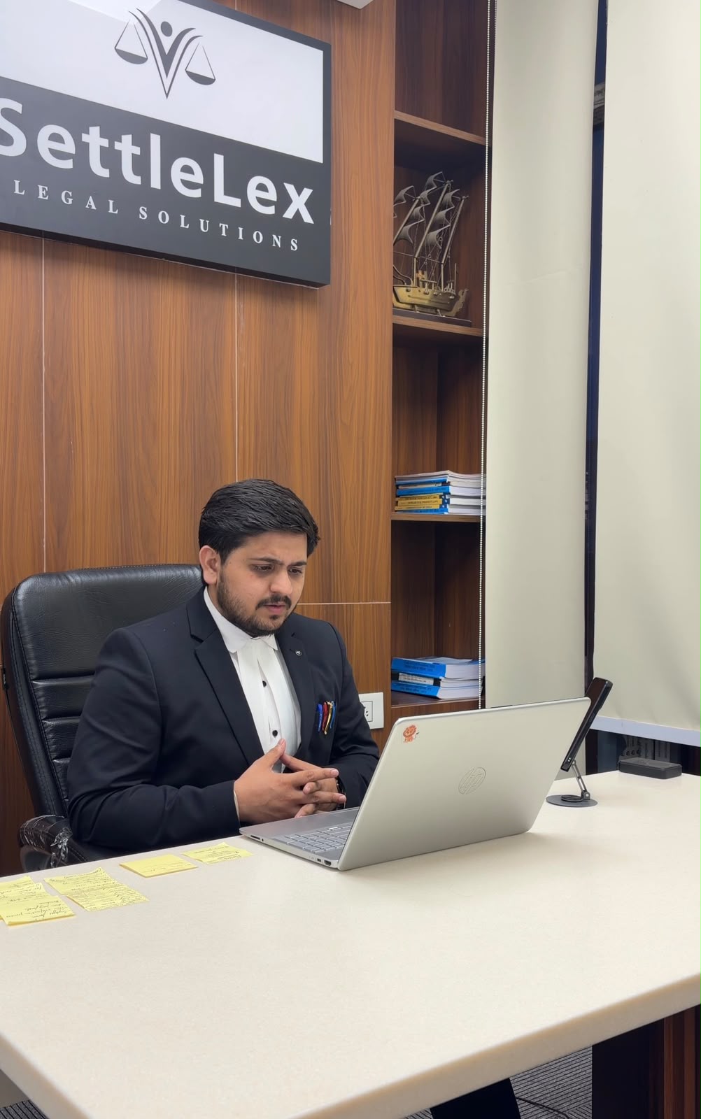 Lawyer reviewing documents at the SettleLex office